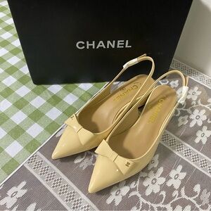 CHANEL Women's Yellow Slingback Heels